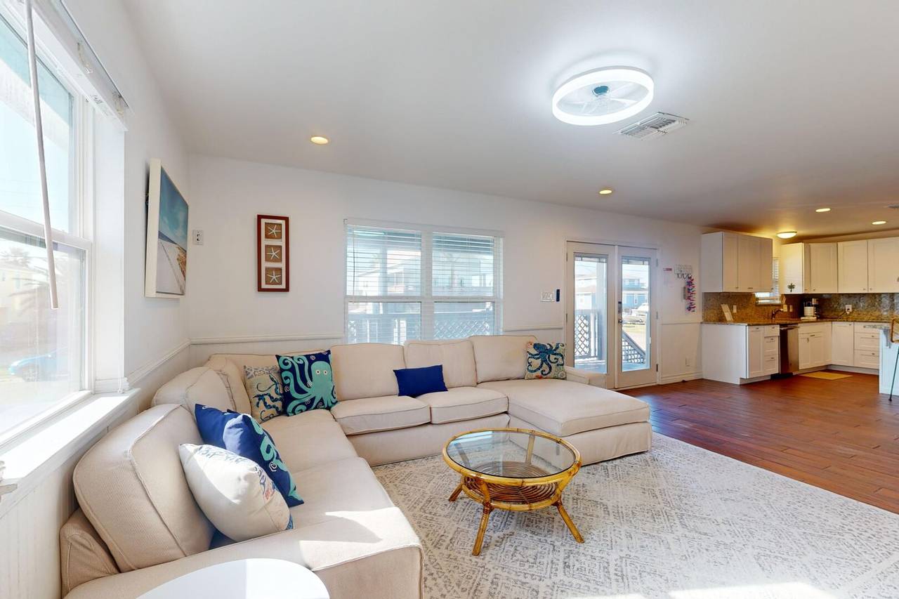 Open living room and kitchen at The Farley Beach House
